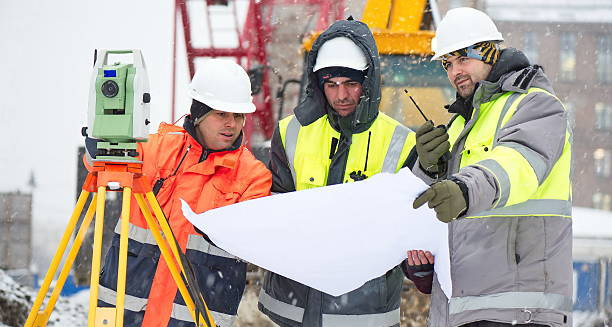 Project team reviewing site plans