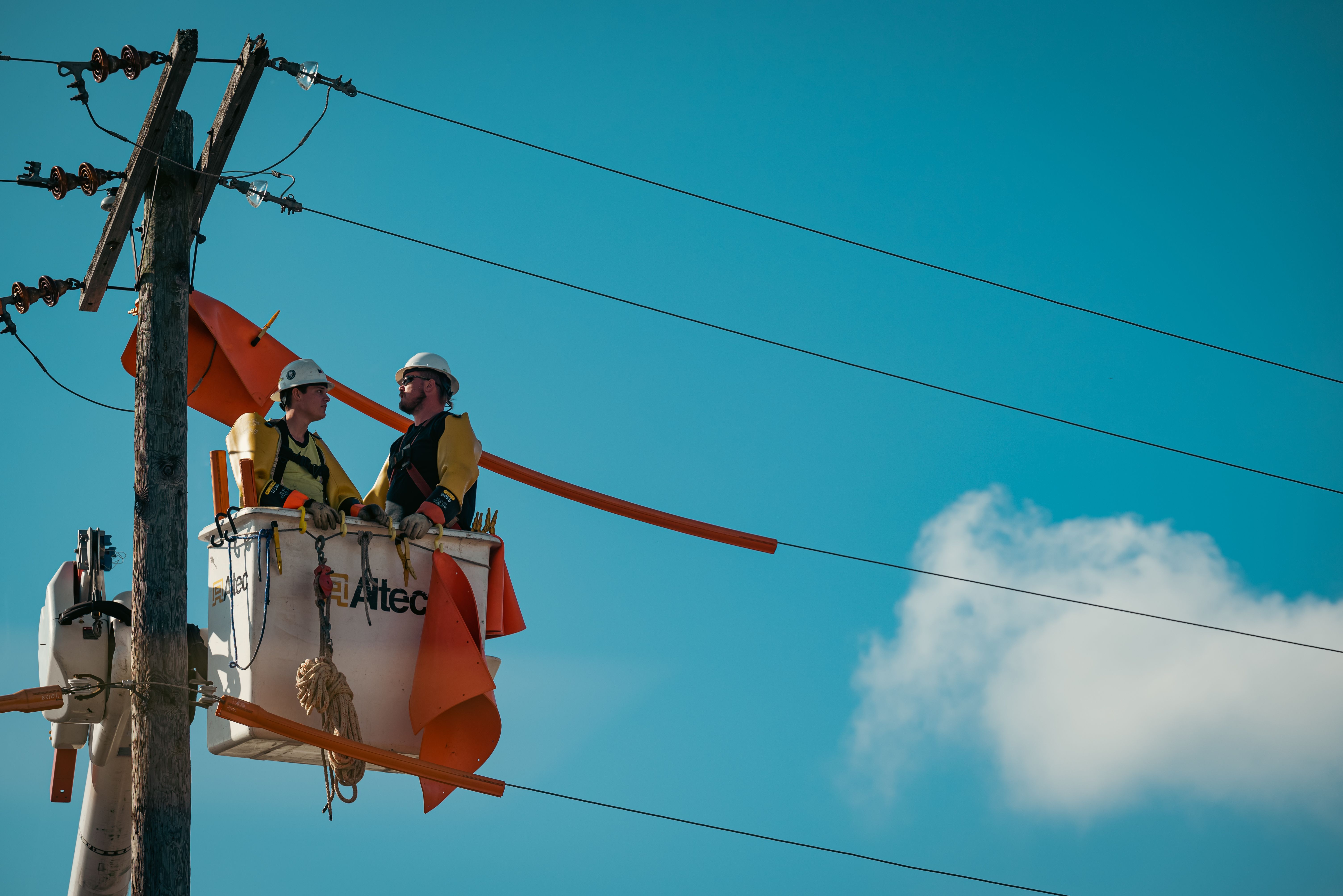 Utility crew working on power line infrastructure